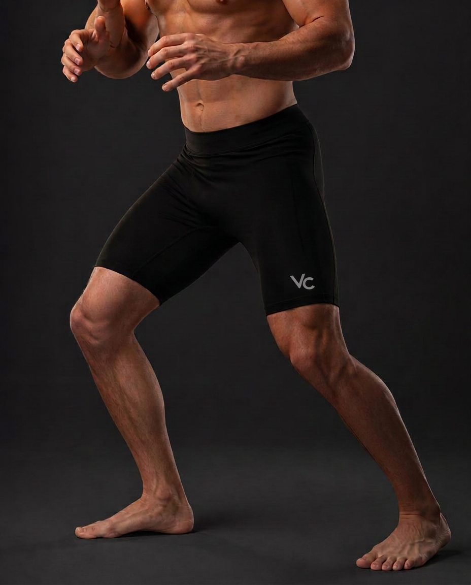 Fight Compression Shorts — Mid-thigh compression shorts for MMA, no-gi, and striking.